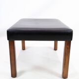 Tabouret en cuir noir et pieds en palissandre, design danois des années 1960