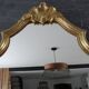 Louis XV style mirror guaranteed with water-gilded wood and gold leaf