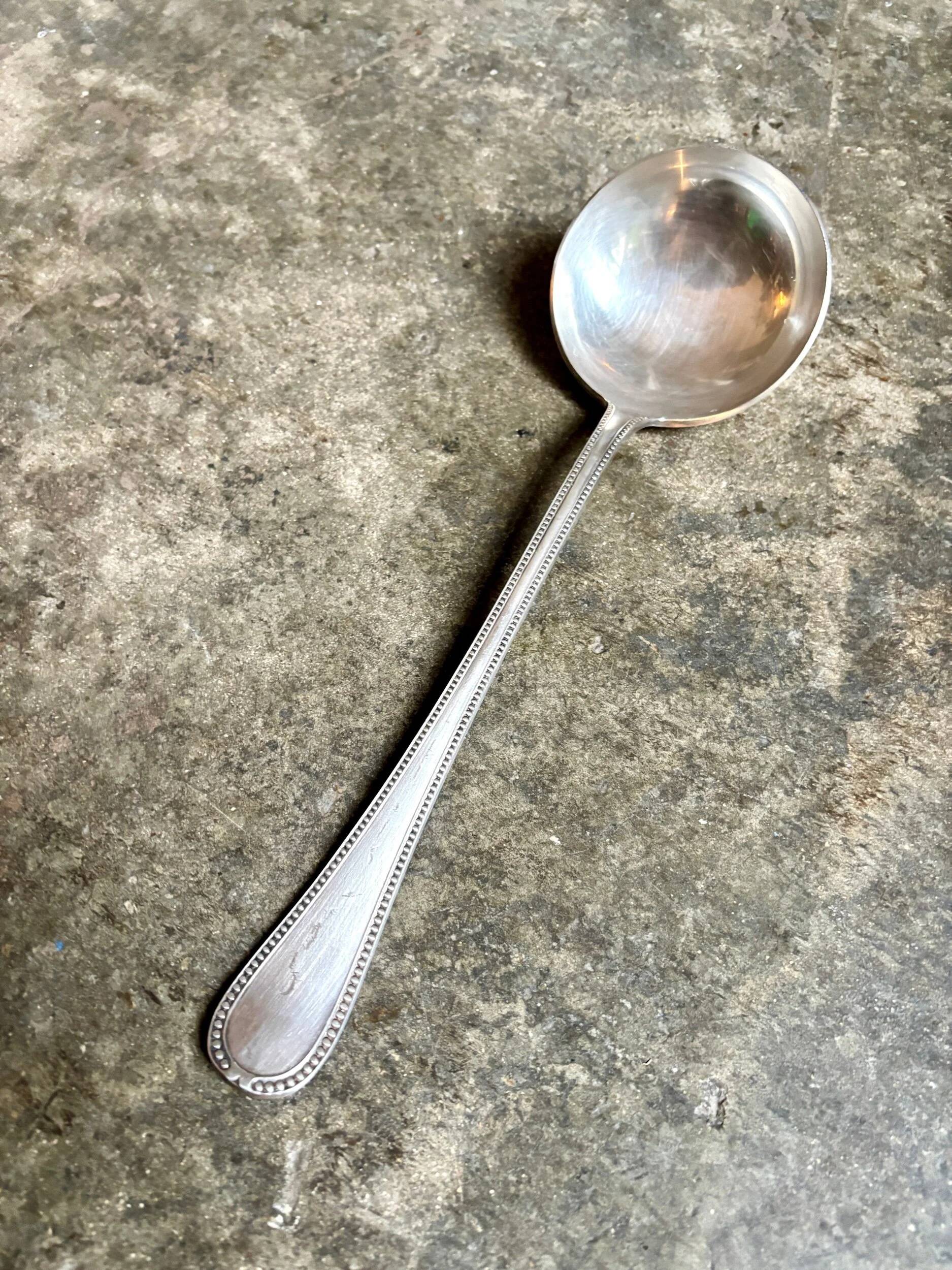 Silver-plated metal ladle, beaded decoration no. 2
