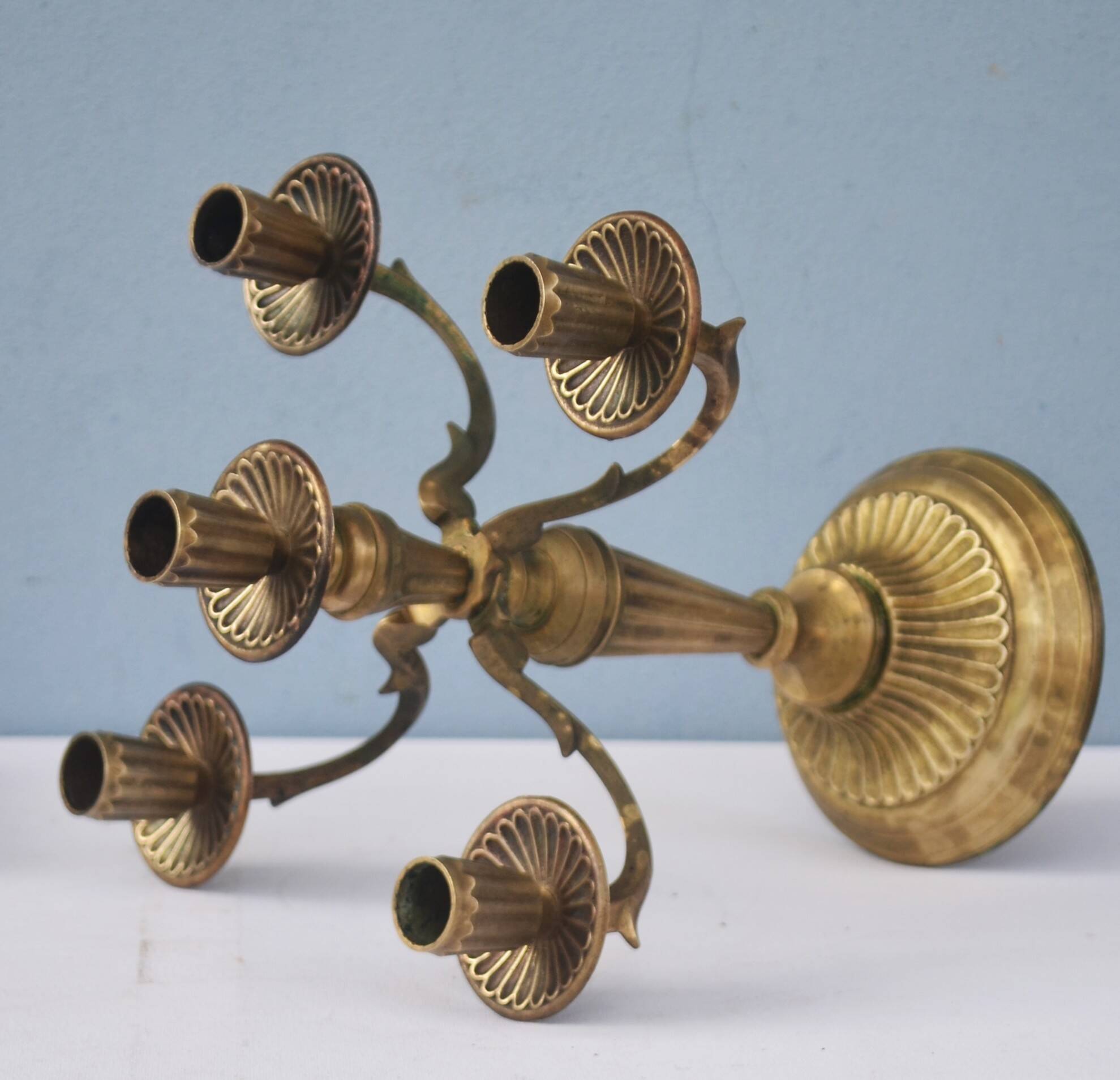 Solid brass candle holder with 5 candles and 4 arms
