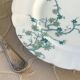 8 Haviland Limoges dinner plates.