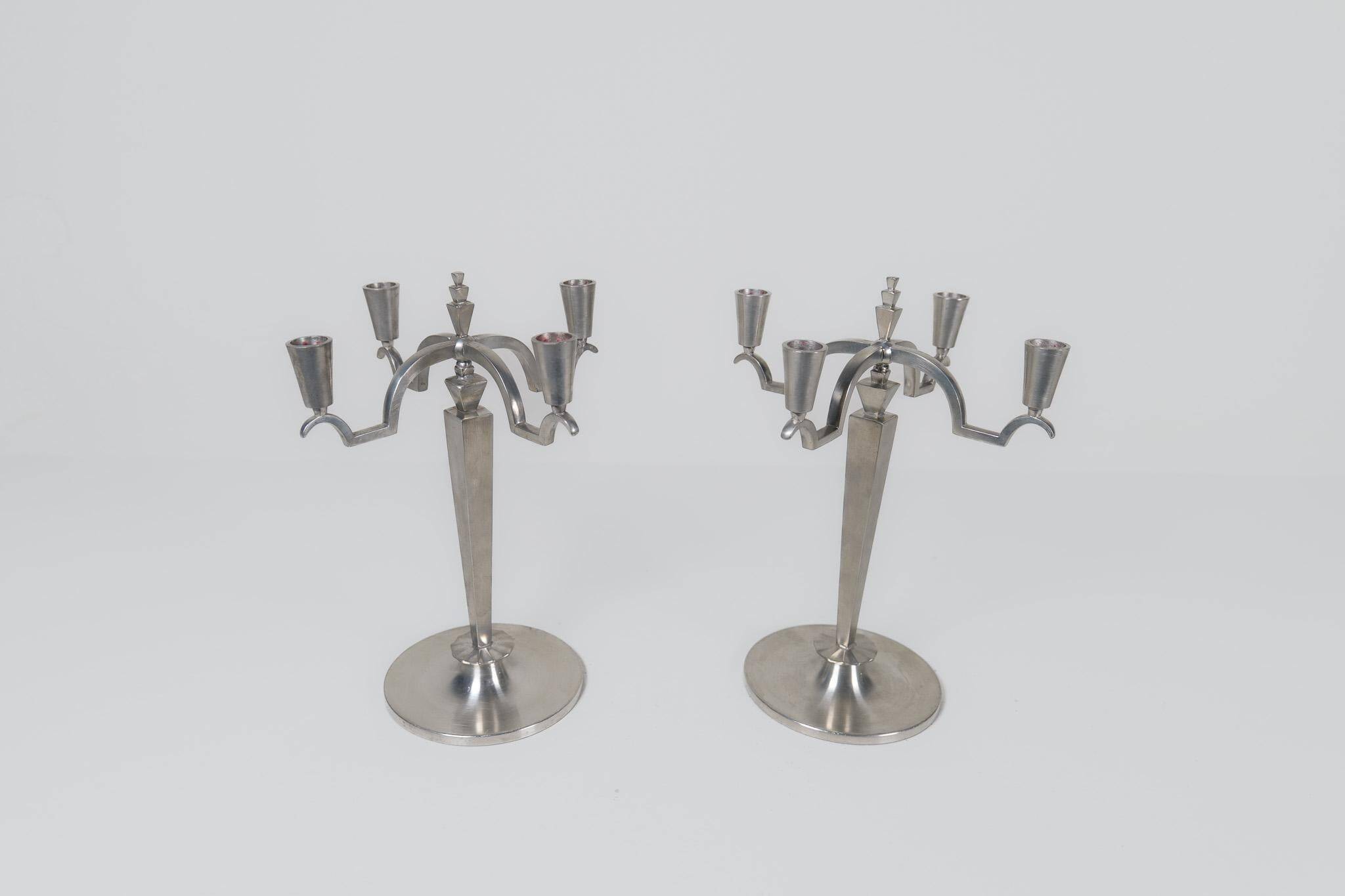 Sculptural Art Deco set of chandeliers in tin, Sweden, 1940s.