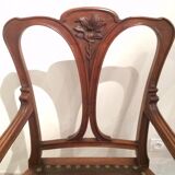 Paire de fauteuils en chêne sculpté