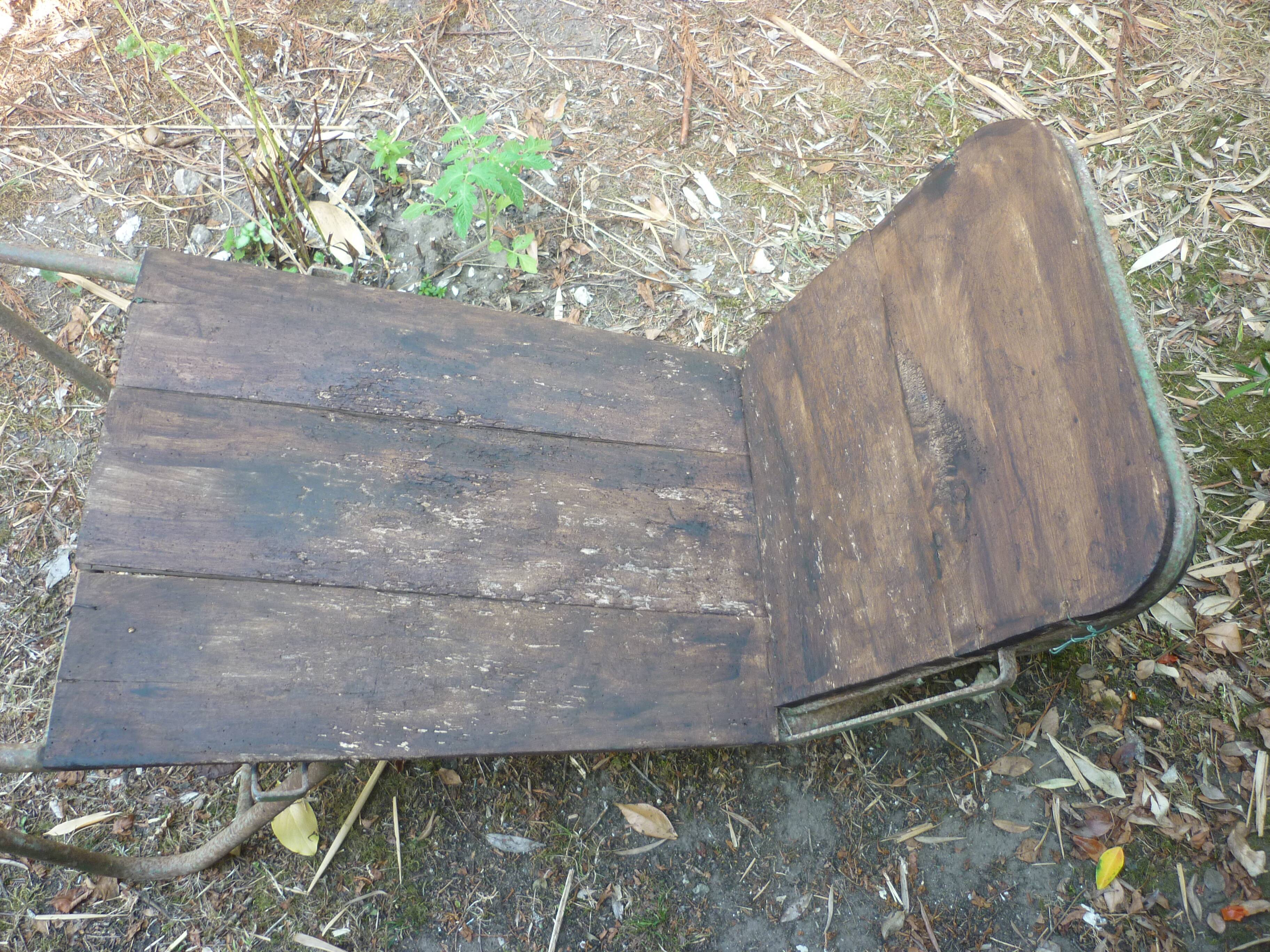 Former wooden and metal wheelbarrow