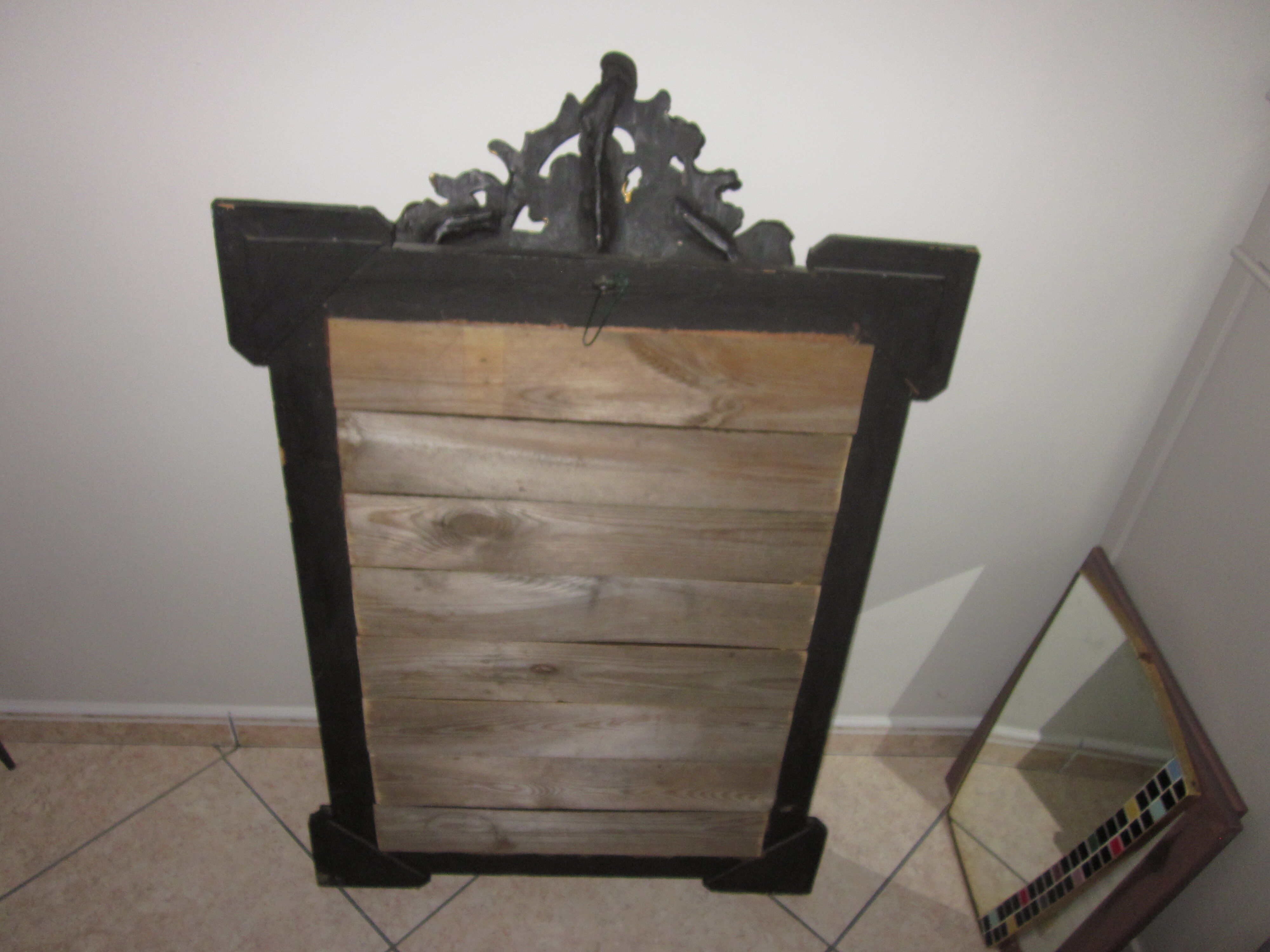 Old mirror with pediment