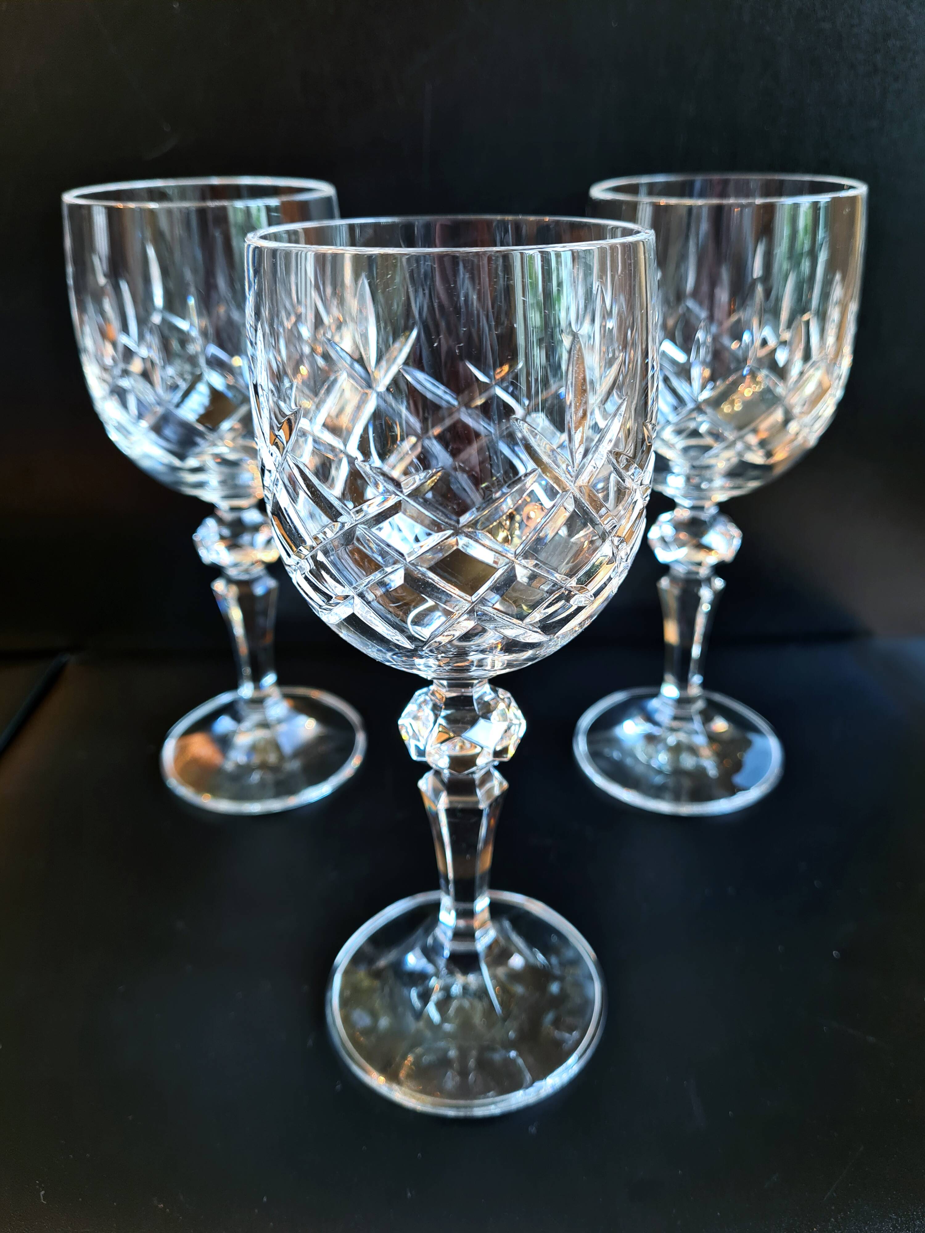 Set of three cut Bohemian Crystal Stemmed Glasses.