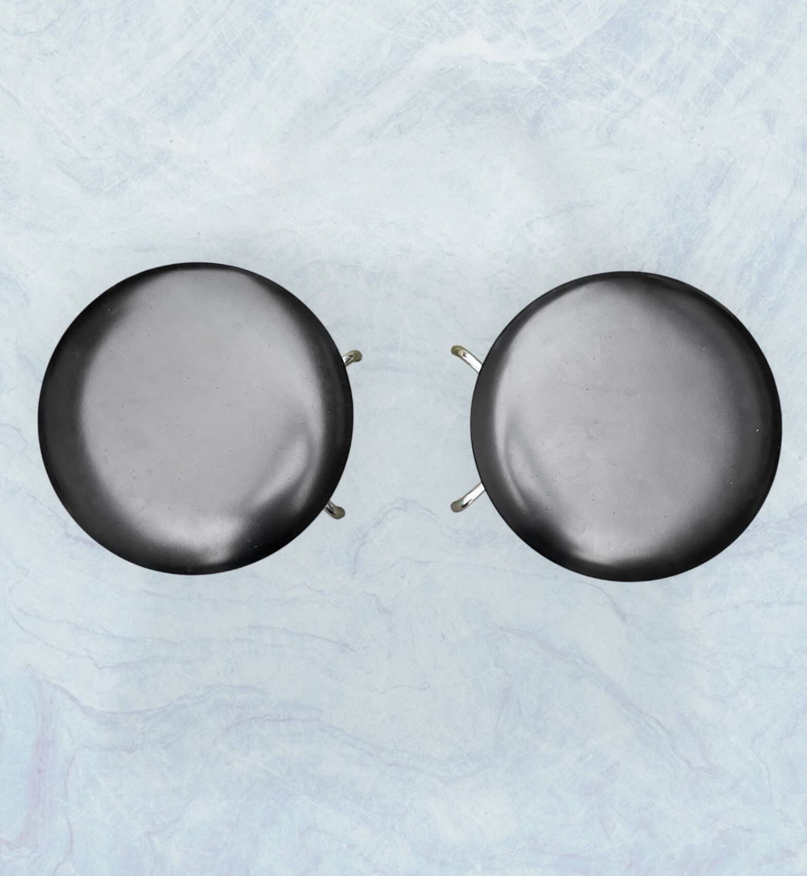 Vintage Brabantia stools in black faux leather and chrome metal – years