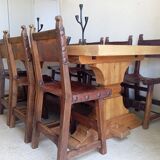 Set of 8 walnut and leather chairs from the 1950s