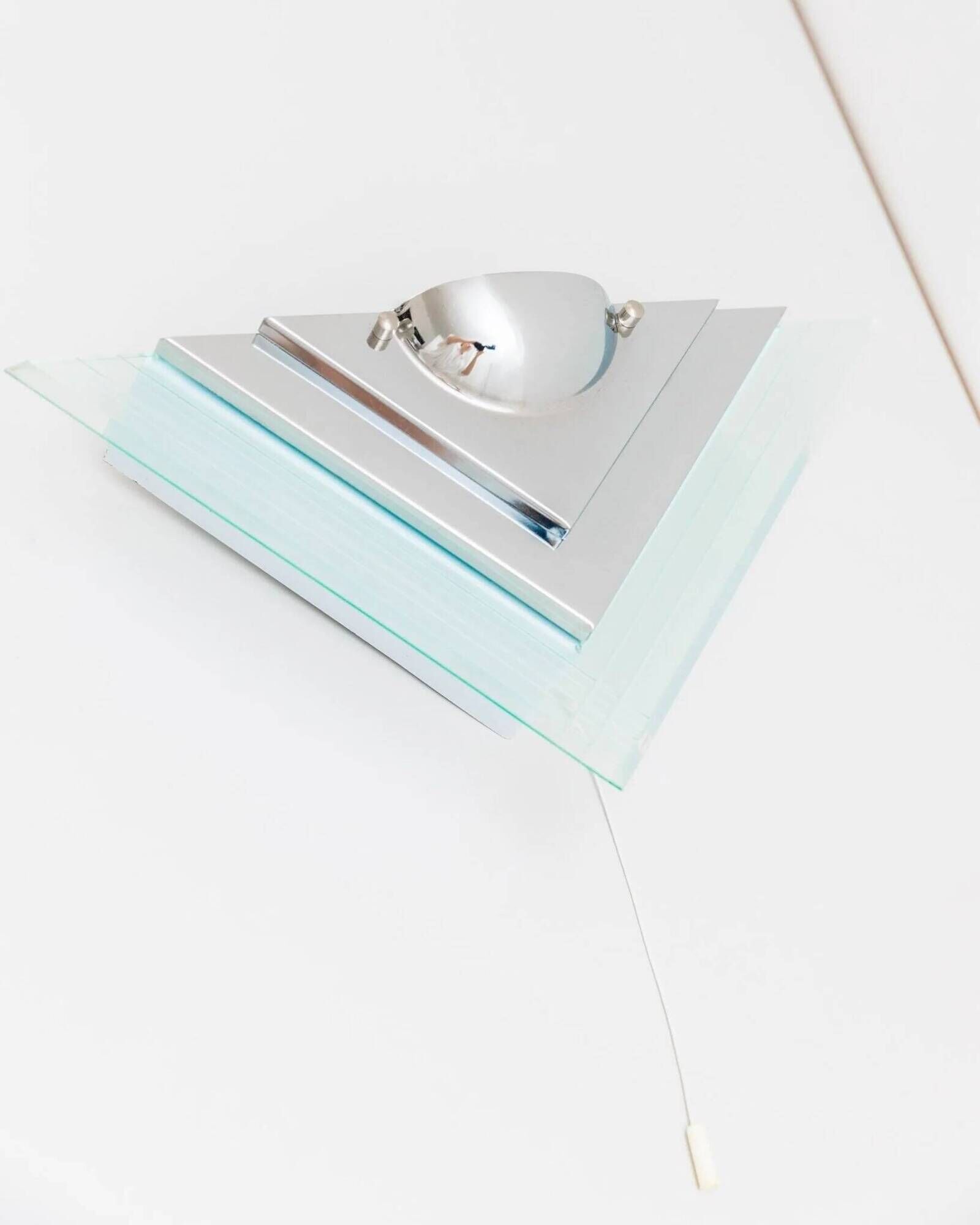 Muted green glass wall lamp with chrome metal accents, Memphis-style postmodern, 1990s