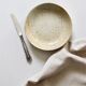 7 speckled stoneware plates