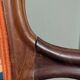 Restored Louis-Philippe cabriolet armchair, blue and orange floral fabric.
