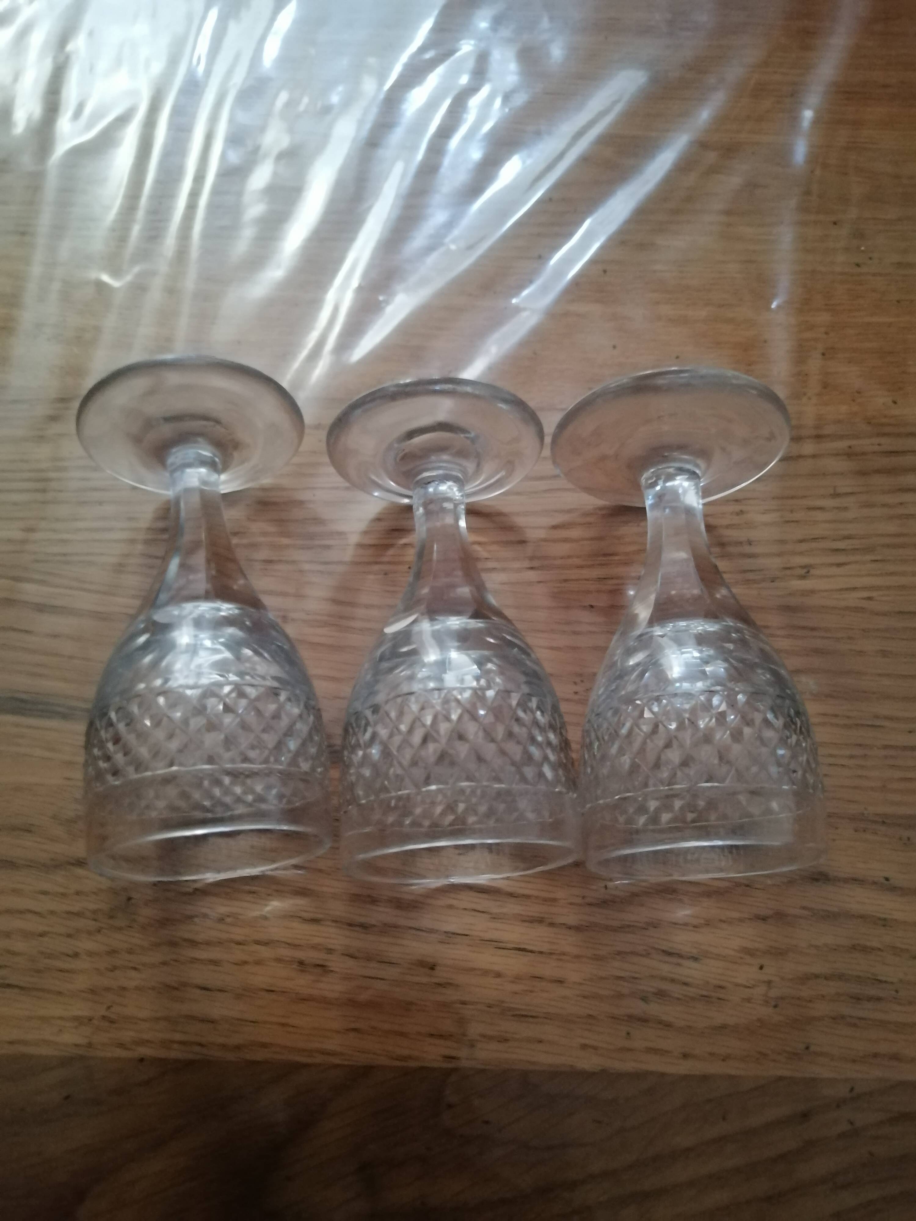 3 old vintage glass on feet