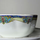Old Lunéville sauce boat, opaque porcelain with polychrome decoration.