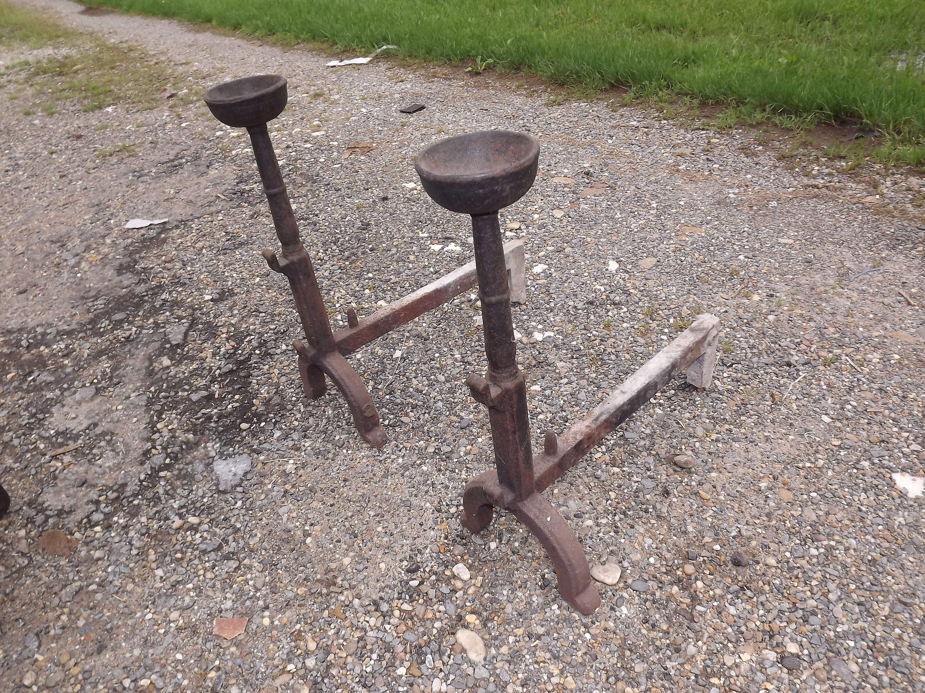 Shield fire with cast iron andirons