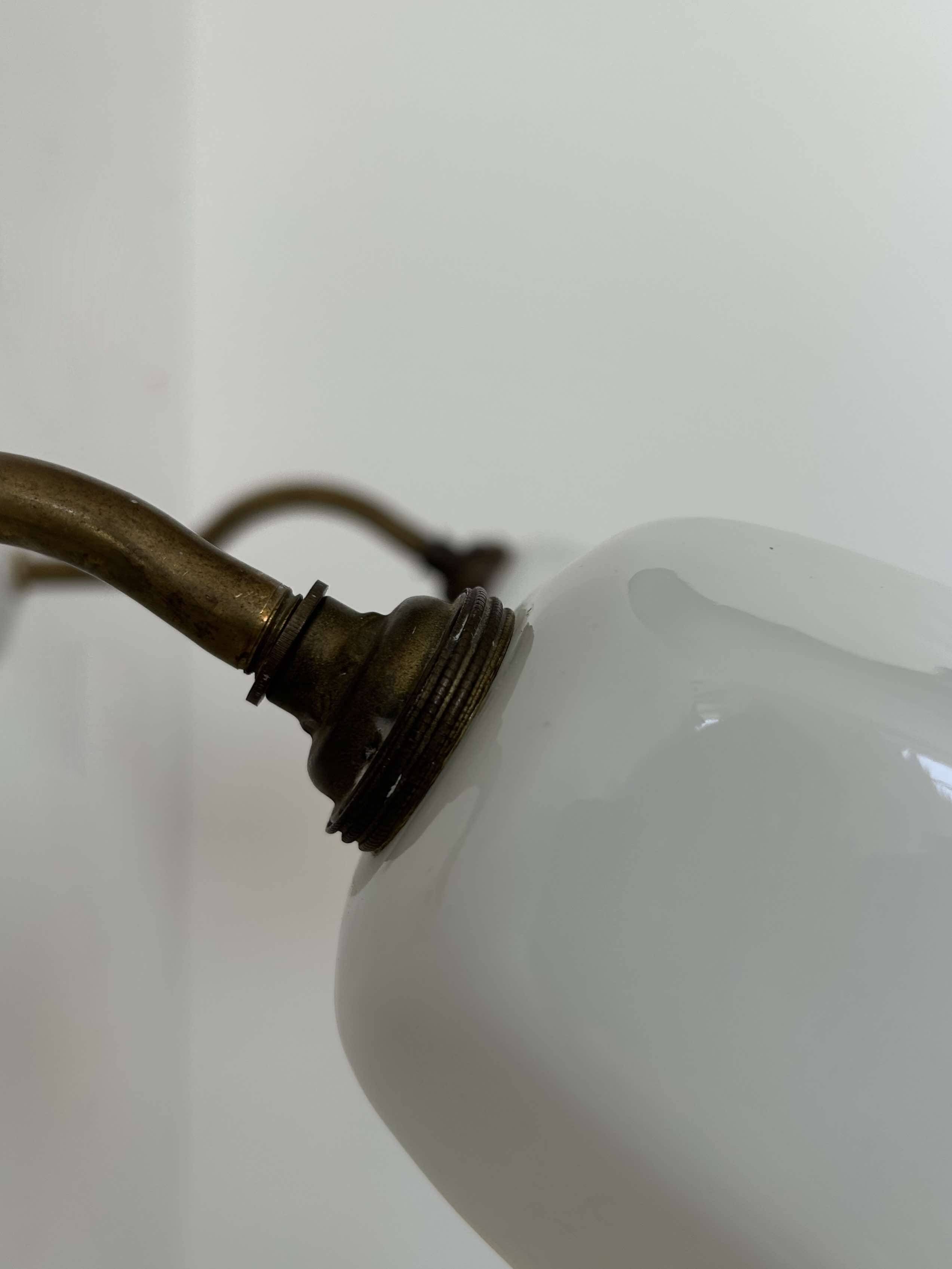 Pair of brass and opaline wall lights, France 1930
