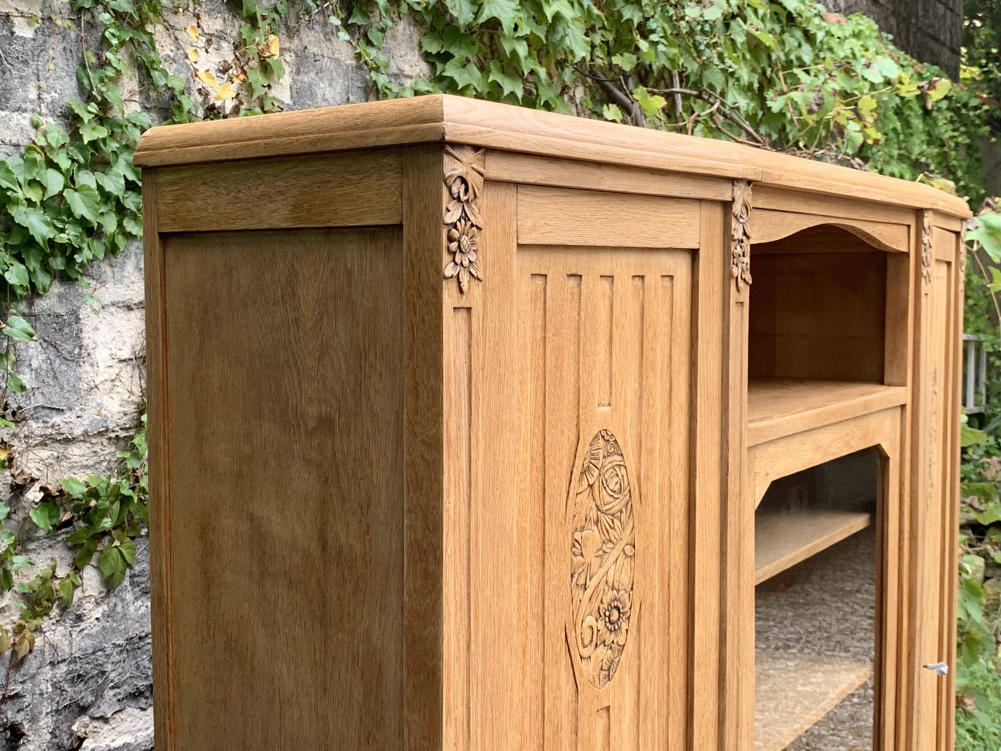 Asymmetrical Art Deco glass-fronted Parisian wardrobe in raw oak, 1930.