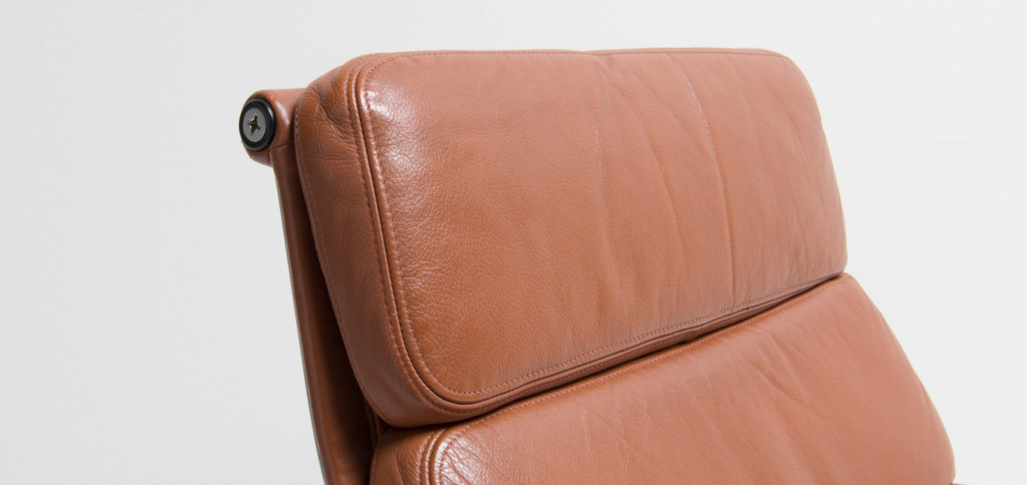 Eames lounge chair model EA 216 softpad in cognac