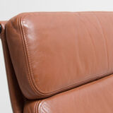 Eames lounge chair model EA 216 softpad in cognac