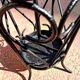 Antique wrought iron umbrella stand for entrance hall, vintage decor.