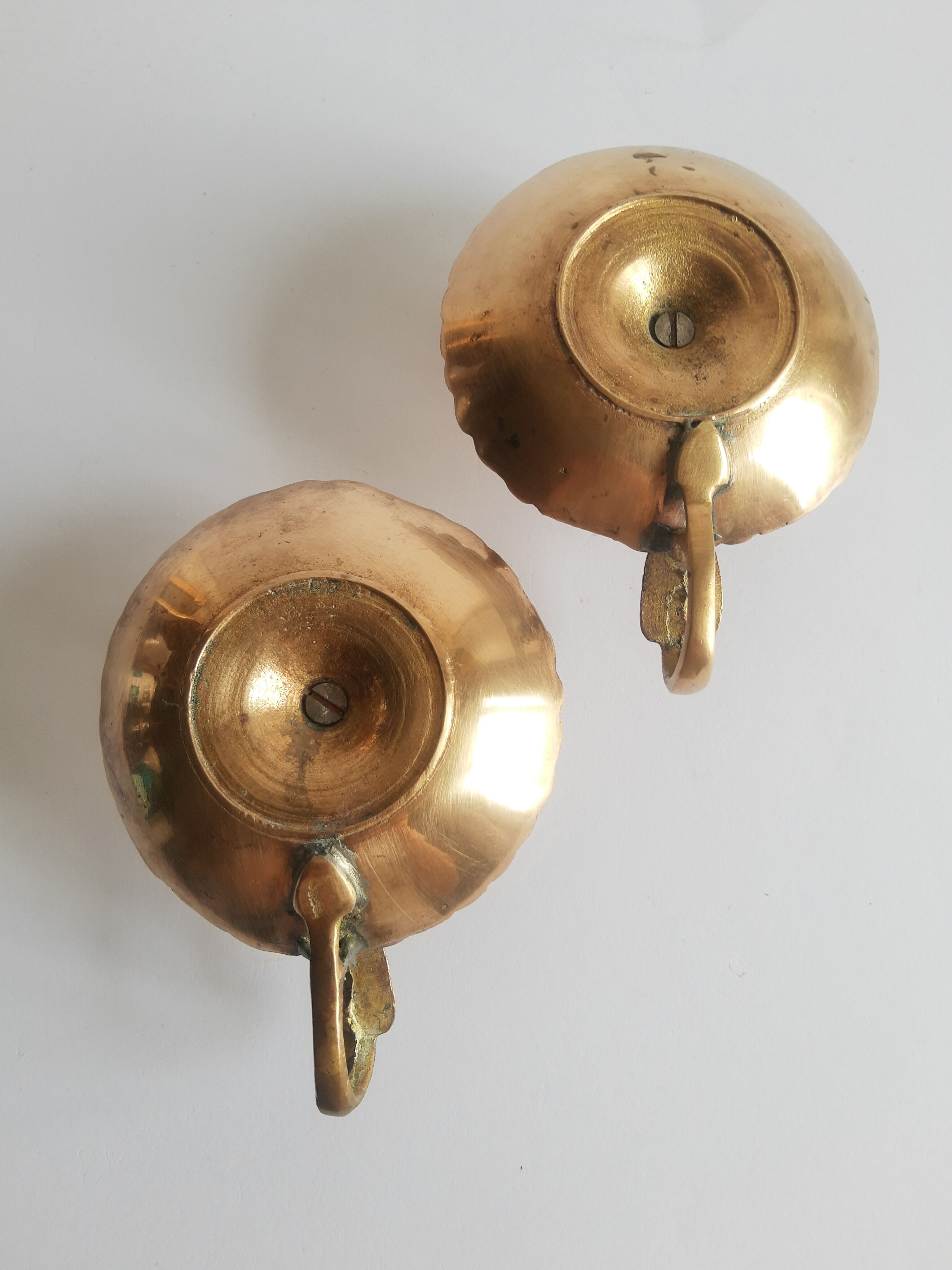 Pair of vintage oriental golden brass cellar candlesticks
