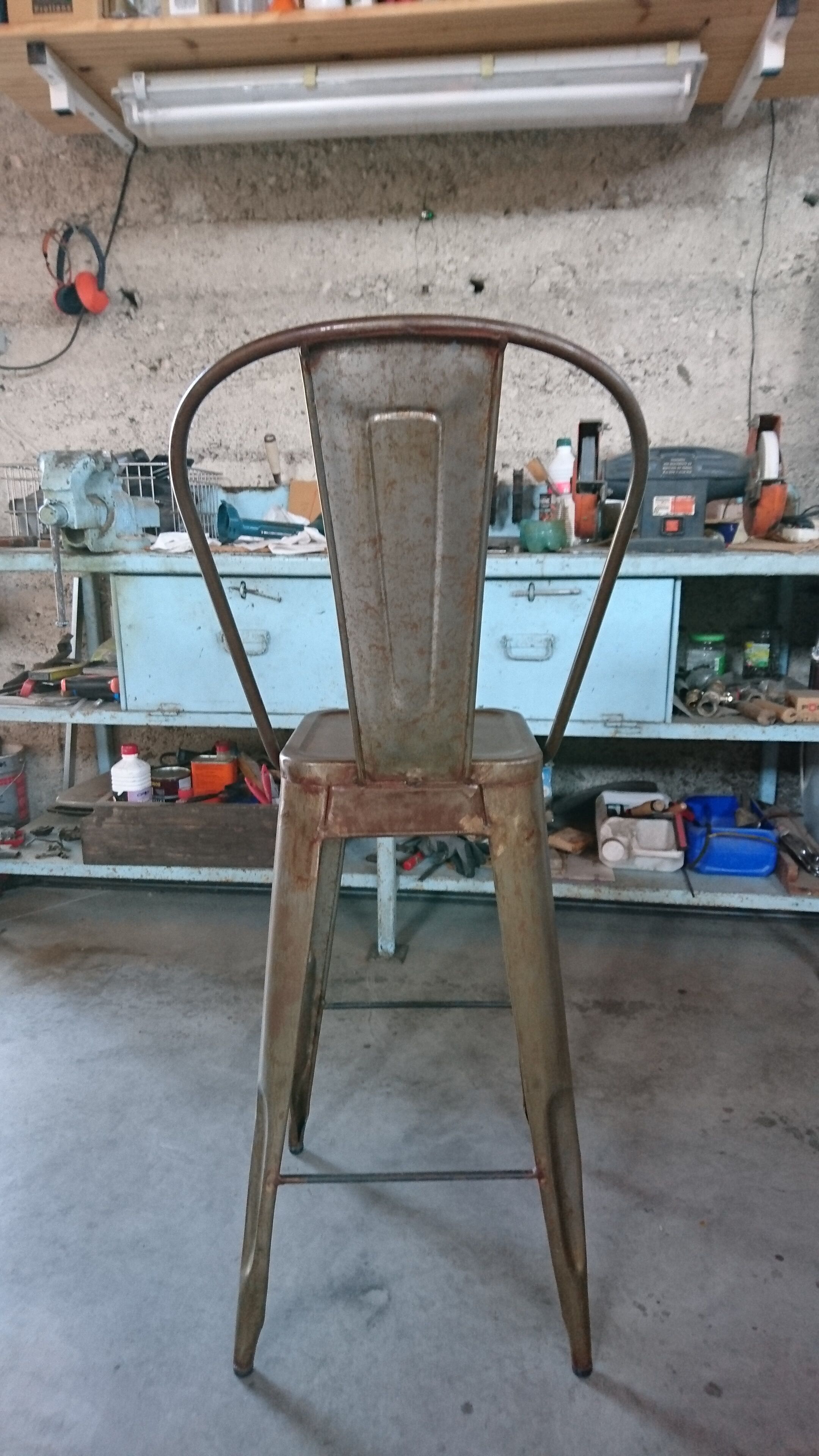Aged industrial stool