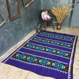 Romanian rug handwoven in wool, purple background with red and yellow stripes