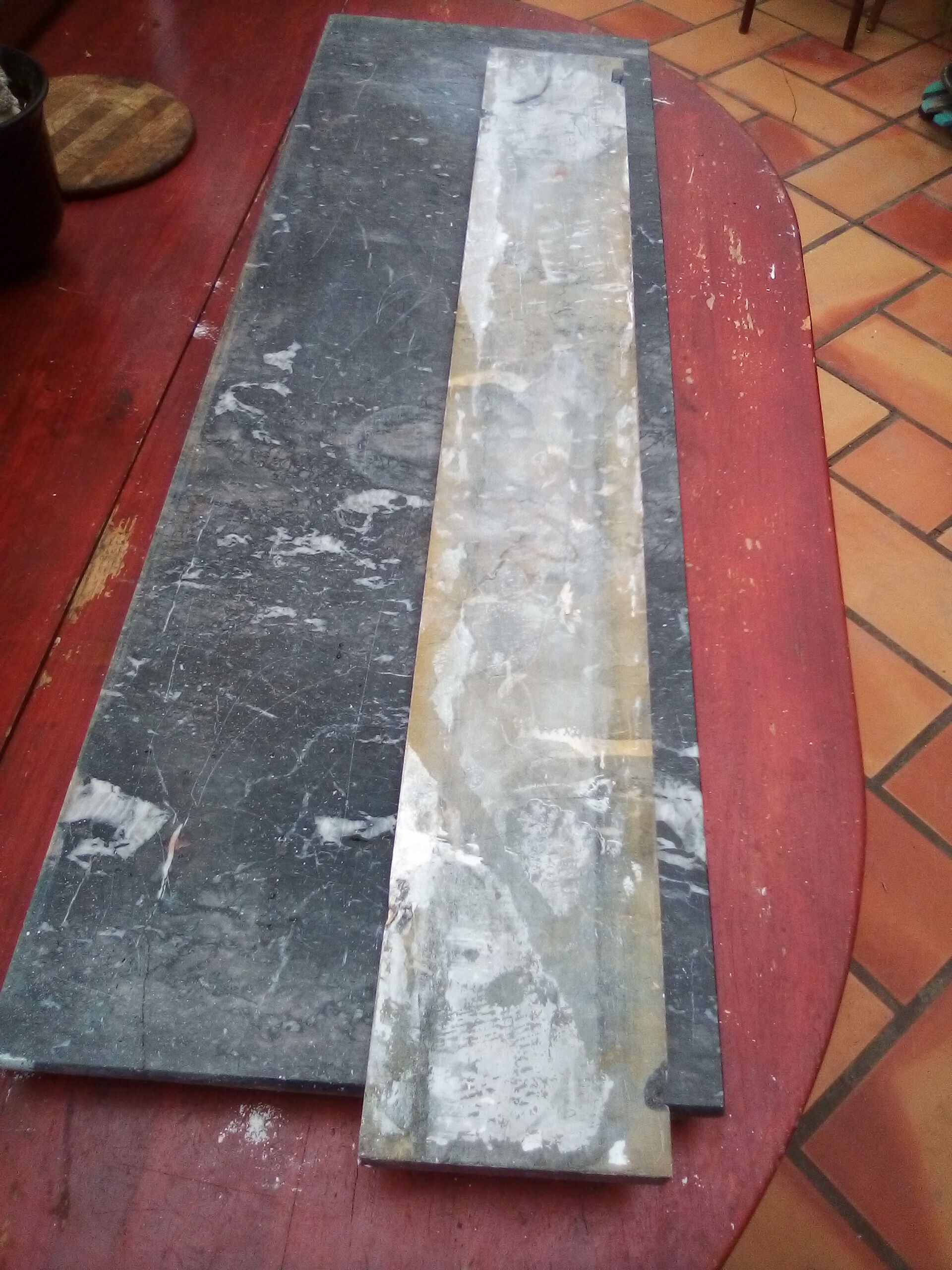 White veined black marble fireplace