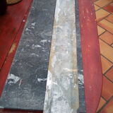 White veined black marble fireplace