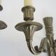 Pair of empire style double light wall lights in silvered bronze. the 50's