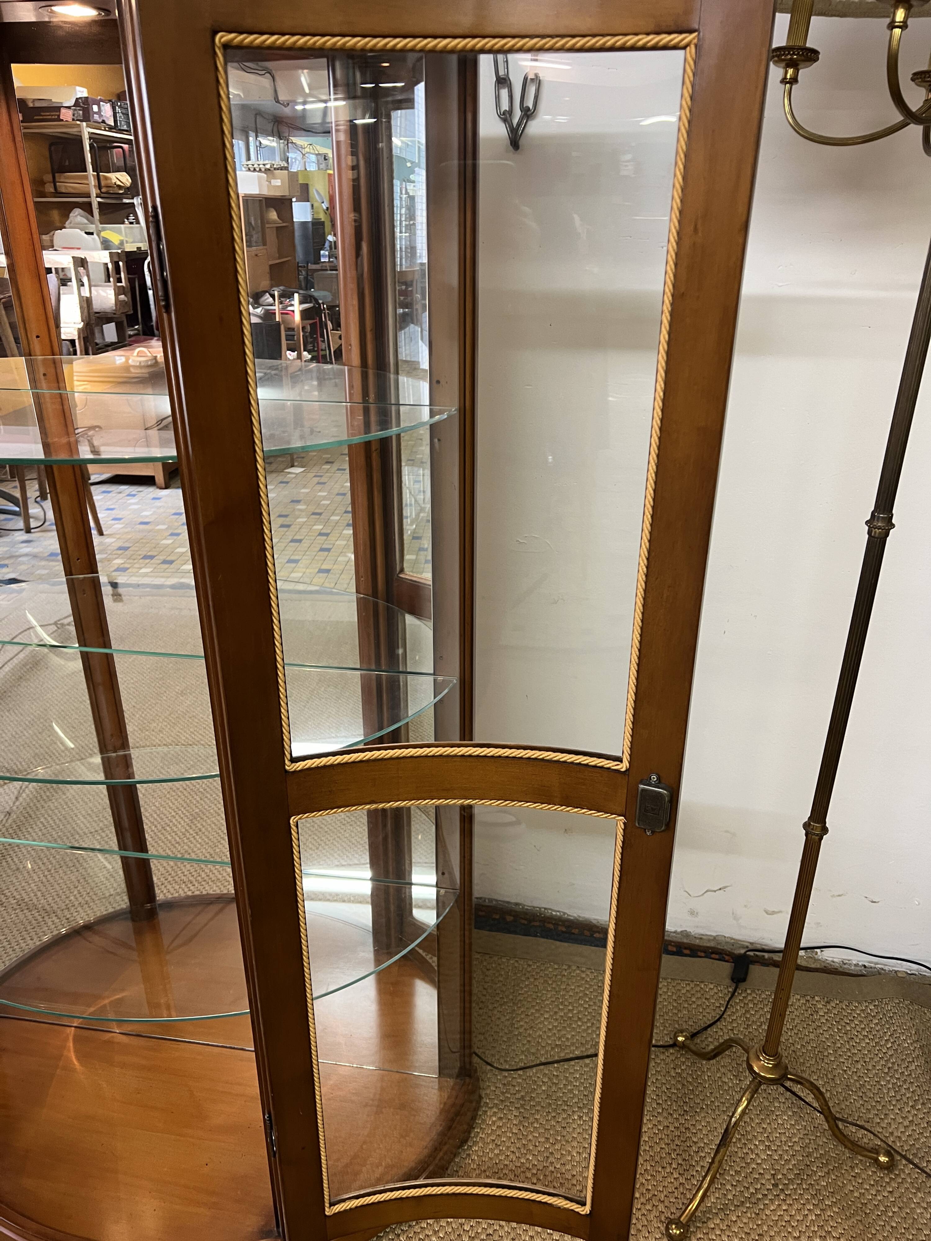 Wooden display case and half-moon mirror
