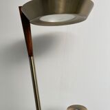 Golden metal floor lamp with reading light