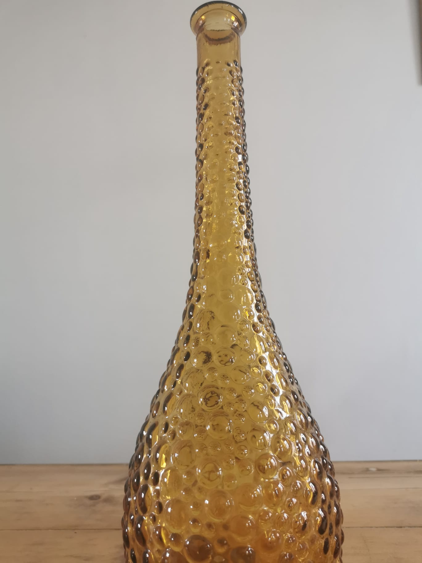 Amber-colored empoli glass decanter
