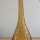 Amber-colored empoli glass decanter