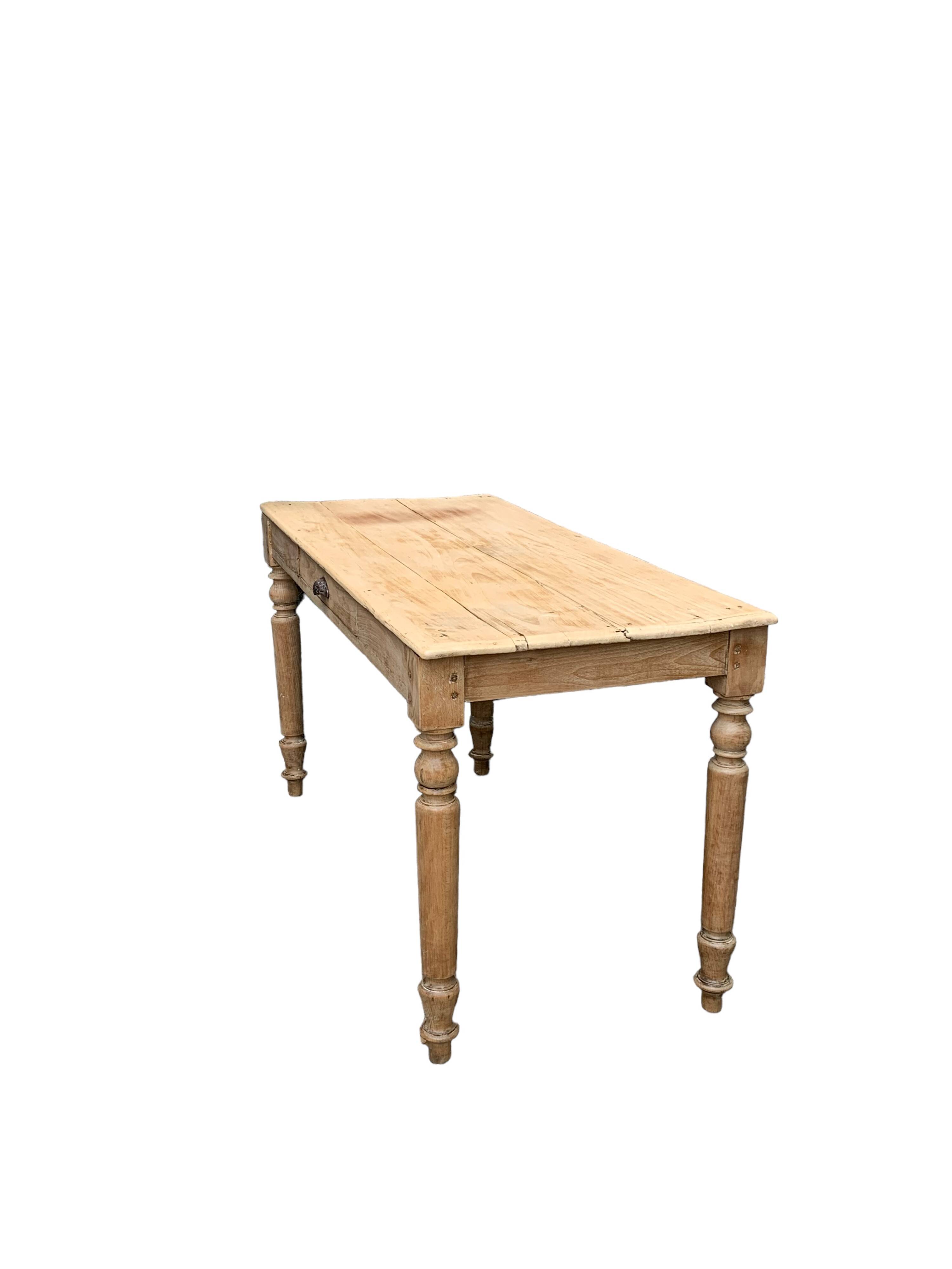 Raw wood farm table 1920