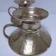 Pair of vintage solid brass hand candlesticks