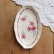 Ravier vintage ivory faience with floral rose decoration.
