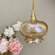 Suspension globe vintage en verre ambré