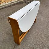 Vintage round folding Scandinavian dining table from the 1970s