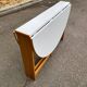 Vintage round folding Scandinavian dining table from the 1970s