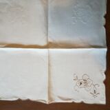 Round off-white tablecloth embroidered with grey flowers with 8 matching napkins - festive table