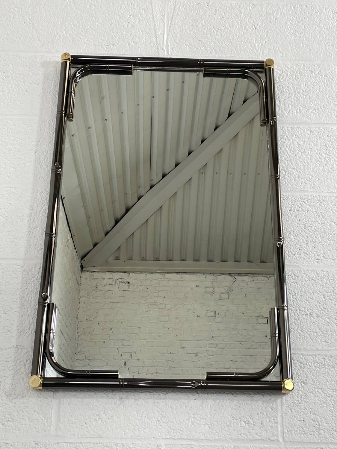 Miroir en métal noir et laiton finission canon de fusil