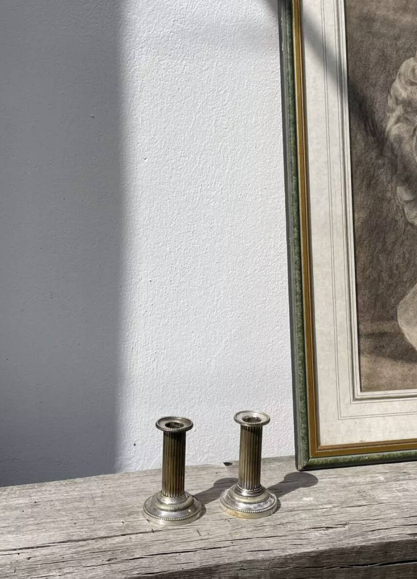 Pair of 19th-century fluted silver-plated metal candlesticks