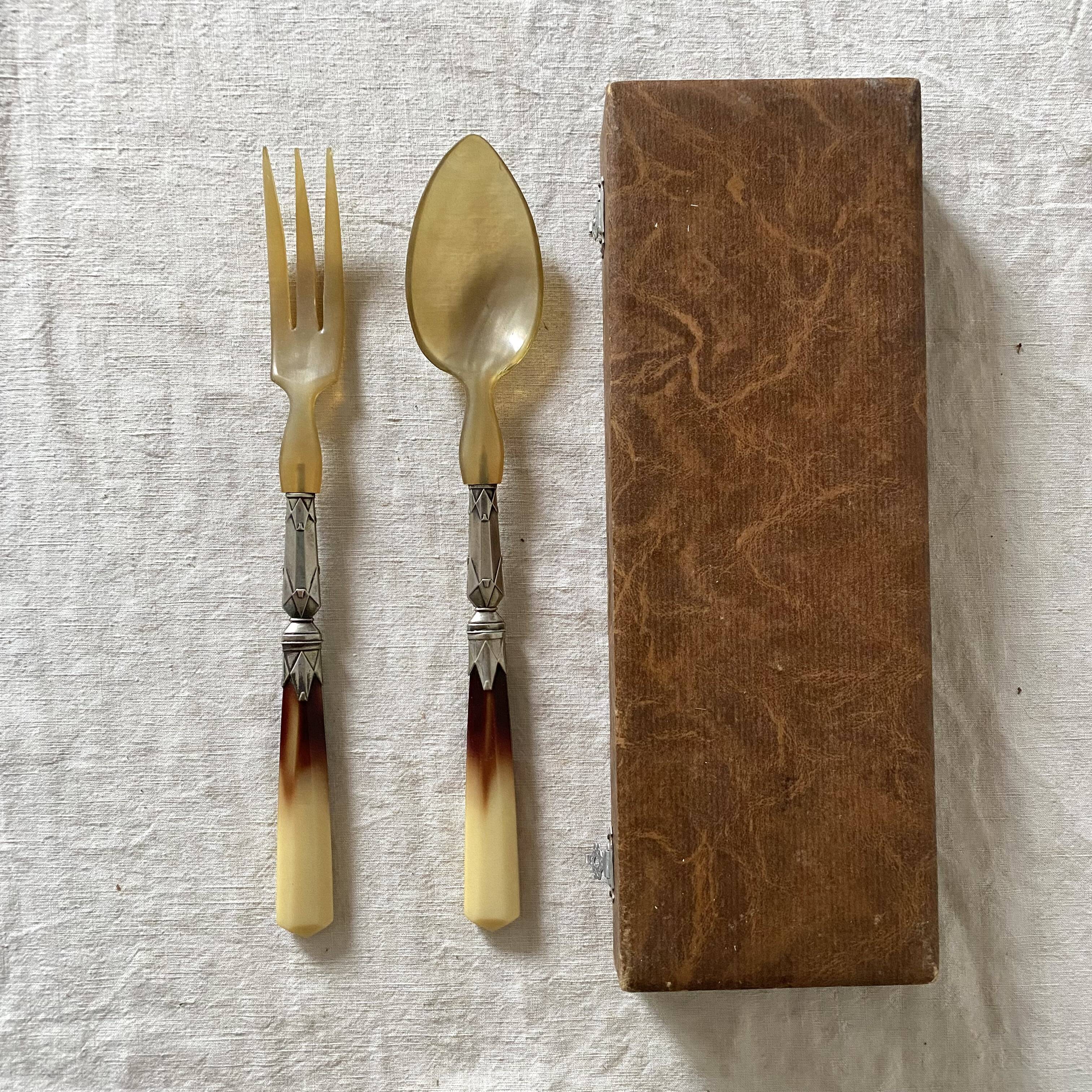 Antique silver plated and horn salad servers