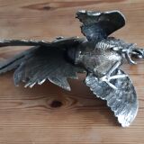 2 silver metal roosters