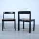 Set of eight black lacquered dining chairs