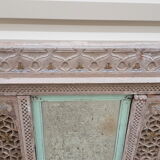 Fully hand-carved stone window with mirror