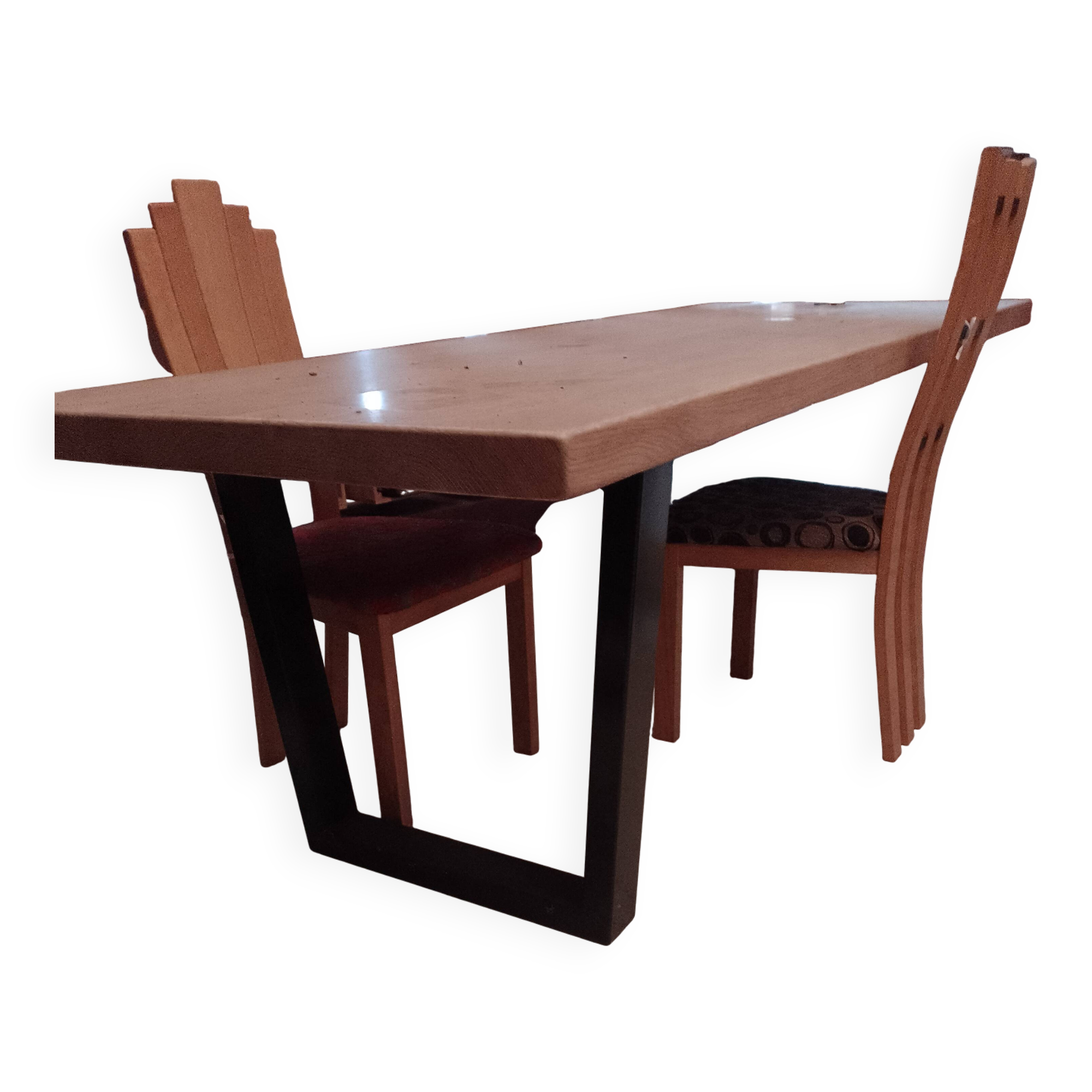 Modern table with metal legs and a natural varnished solid oak top