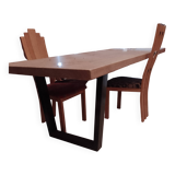 Modern table with metal legs and a natural varnished solid oak top