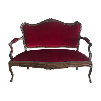 Louis XV style sofa trimmed with red velvet