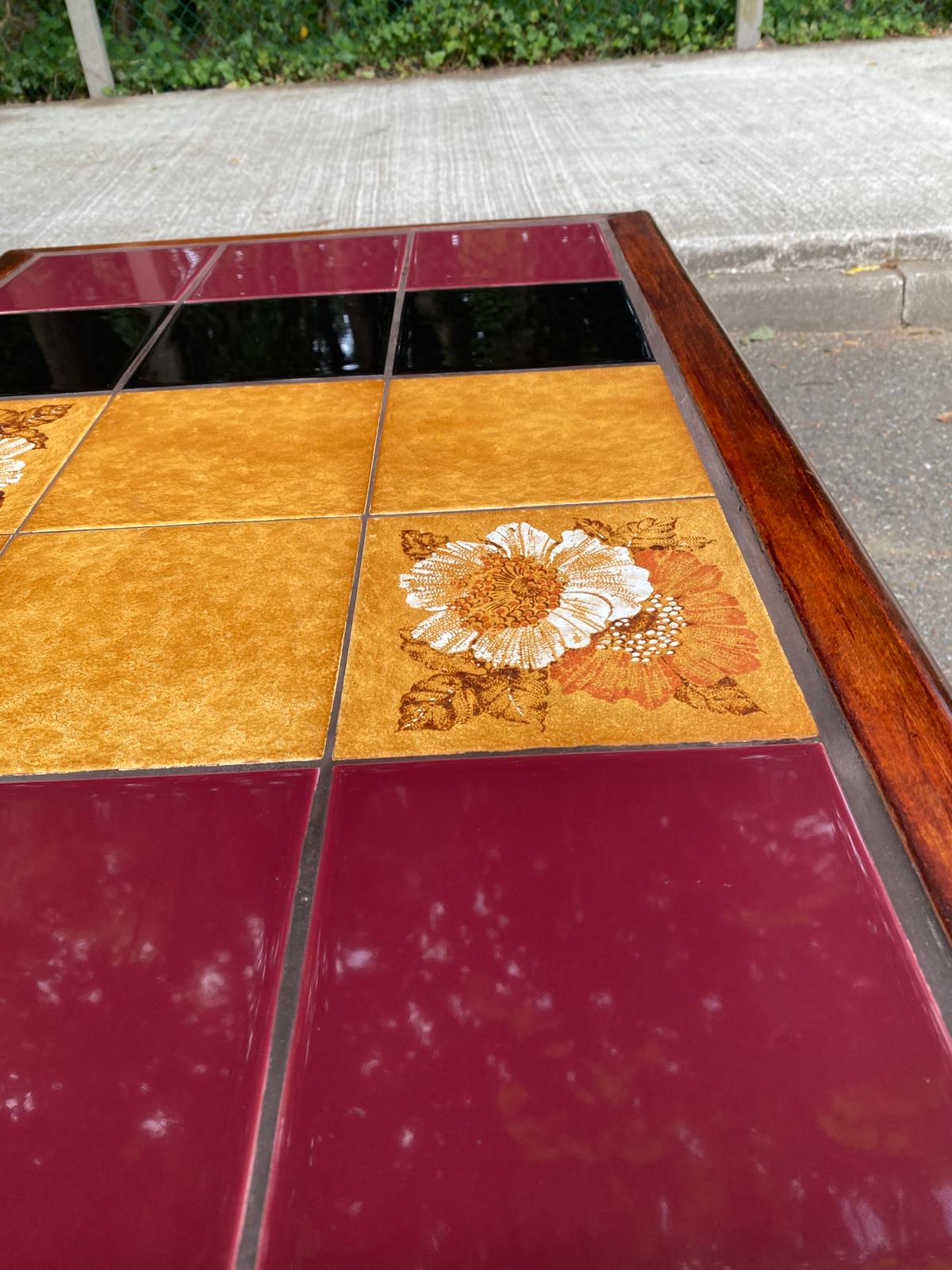 Solid wood and multicoloured ceramic coffee table from the 1970s.